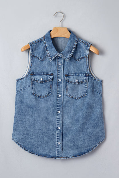 Women's Vintage Denim Wash Acid Wash Sleeveless Denim Button-Up Tank Top featuring a collared neckline, snap button front, western yoke, flap chest pockets, and curved hem.