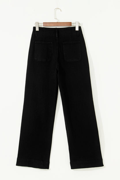 Black high rise wide leg jeans with double-button waistband, front pockets and cropped hem.