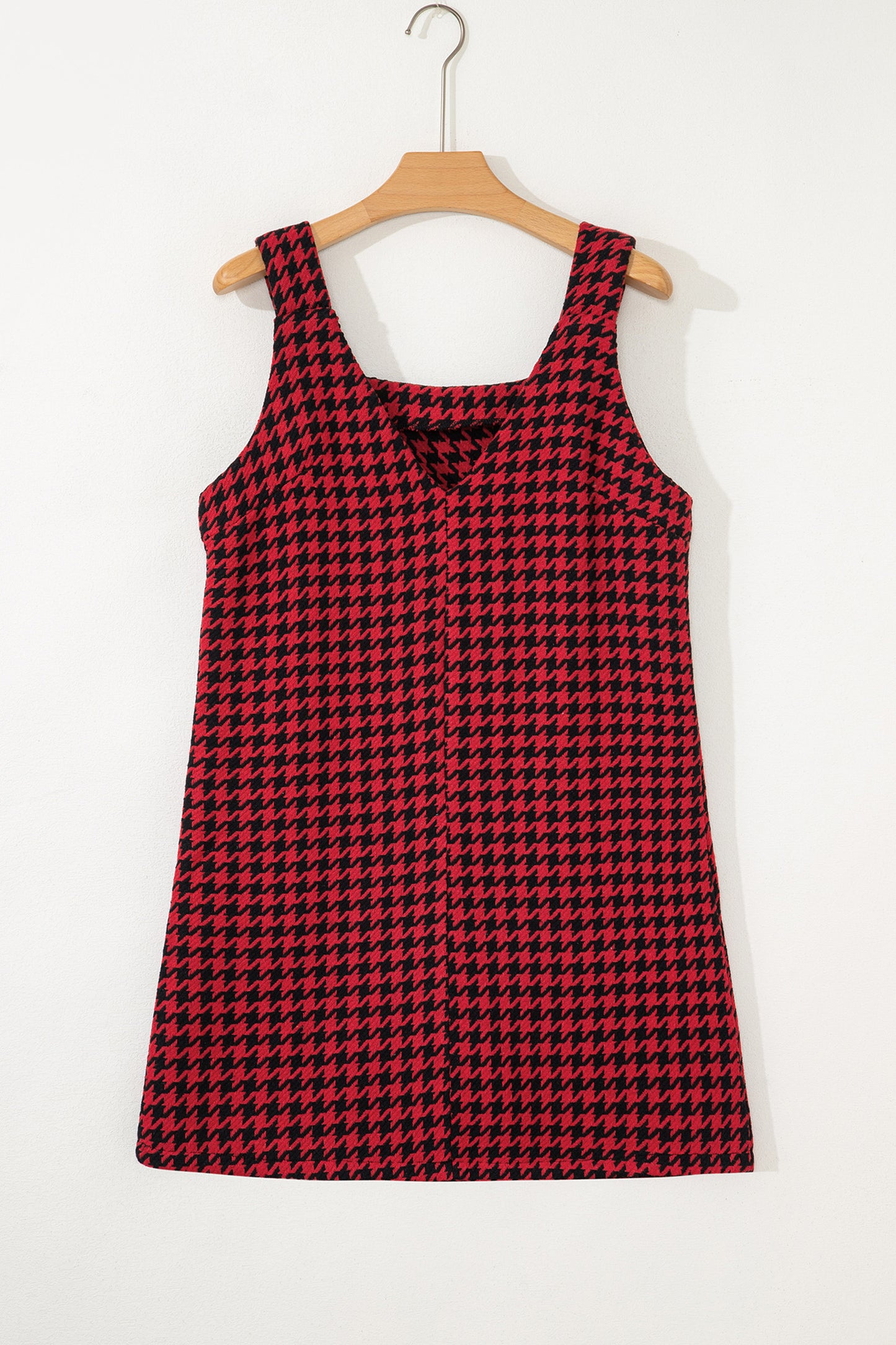 Red textured houndstooth jacquard sleeveless mini dress with V-neckline and A-line silhouette.