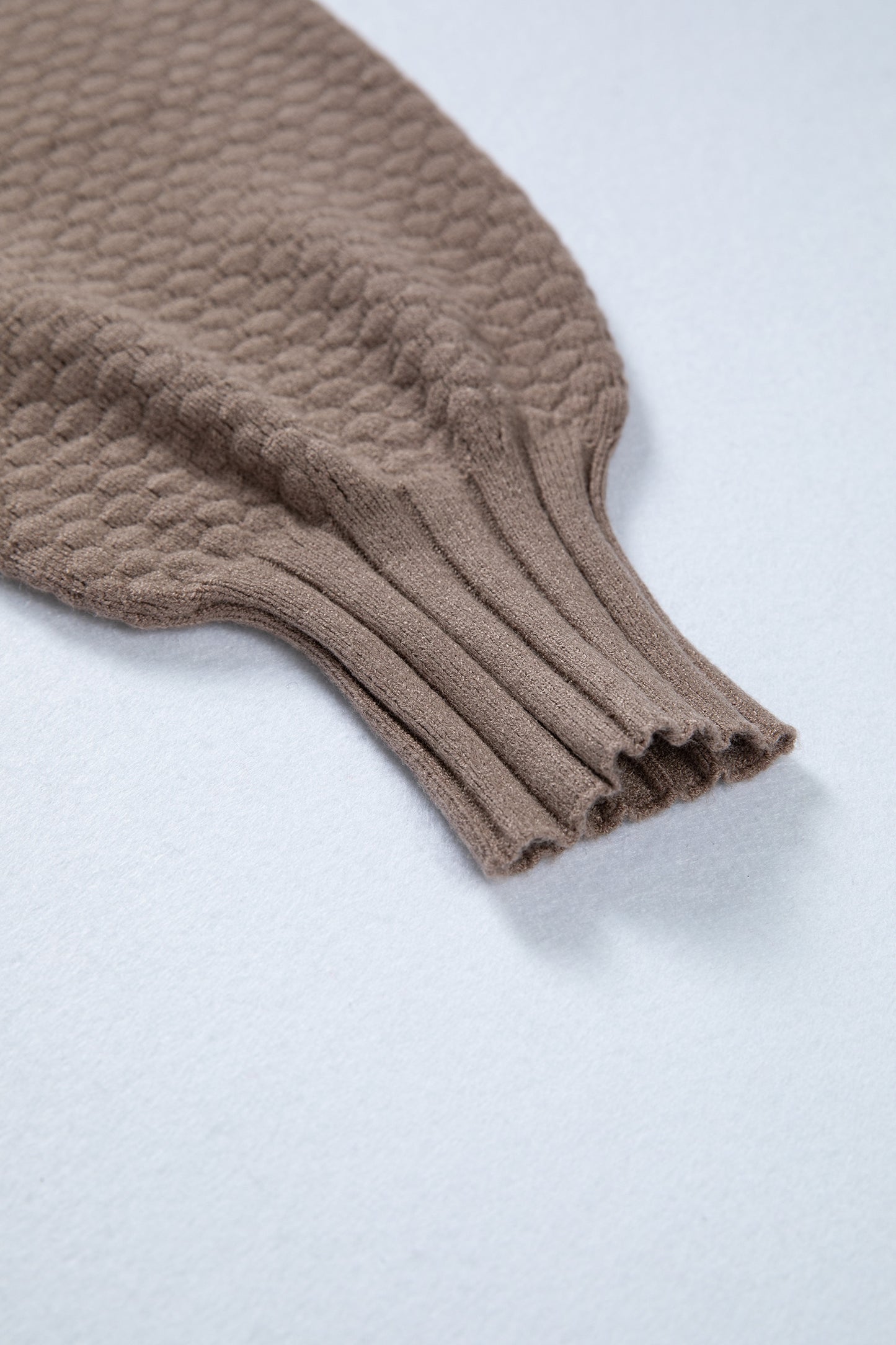 Women's taupe textured bishop sleeve cardigan with a V-neck, button-front closure, mixed knit texture, and relaxed fit.