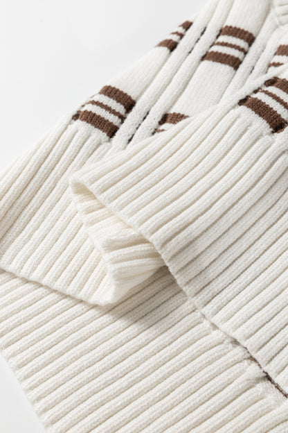Oatmeal knit sweater vest with brown striped pattern, V-neckline, sleeveless design, and ribbed trim.
