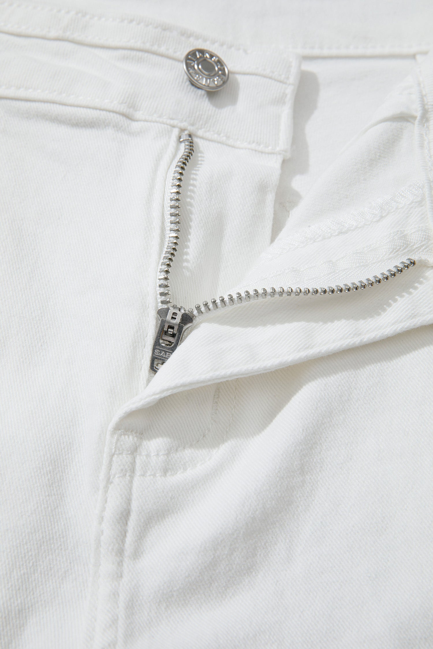 Women’s white high-waist wide-leg jeans with classic five-pocket styling and a relaxed full-length silhouette