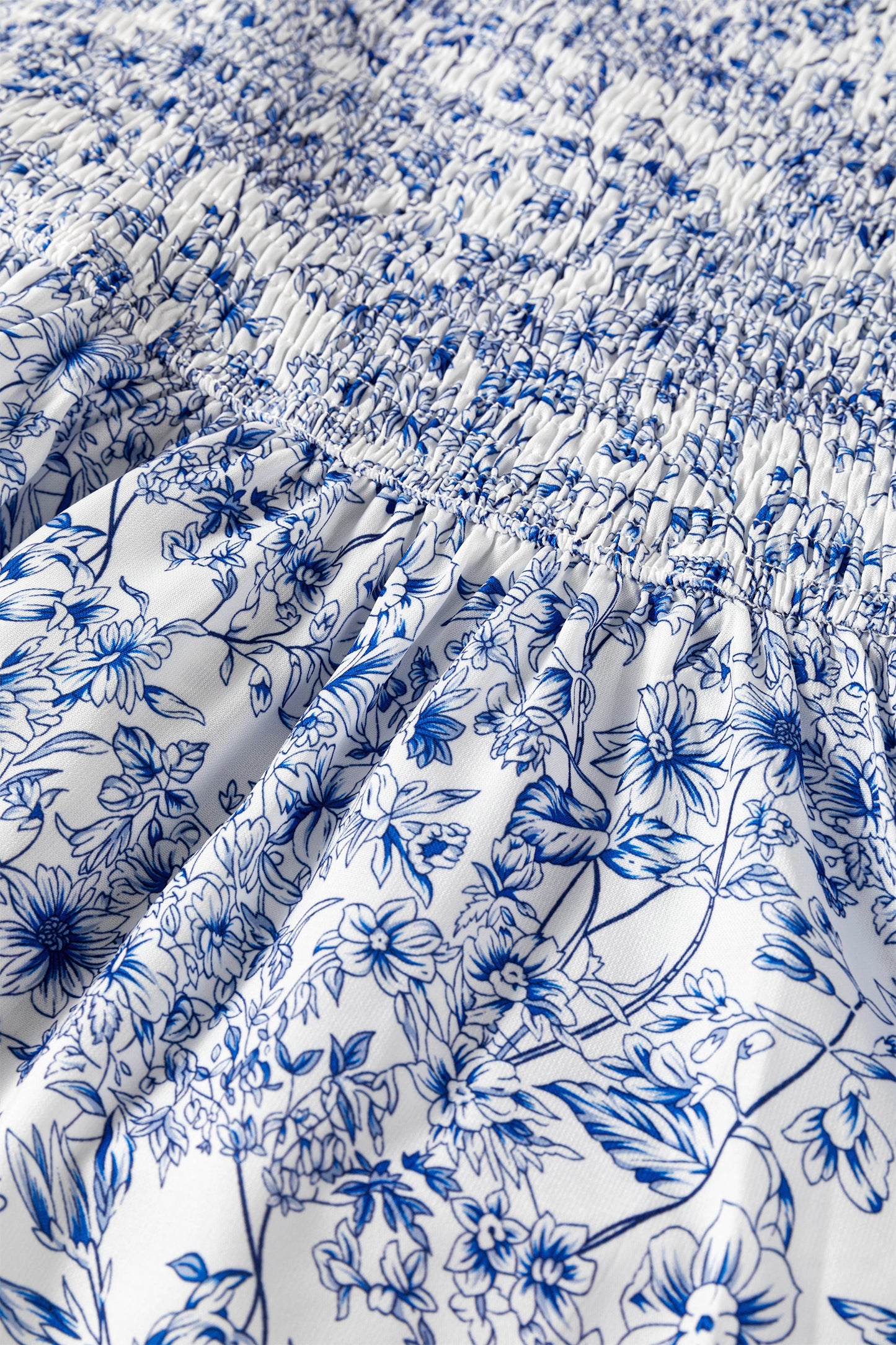 Blue Floral Square Neck Smocked Babydoll Blouse with Flutter Sleeves