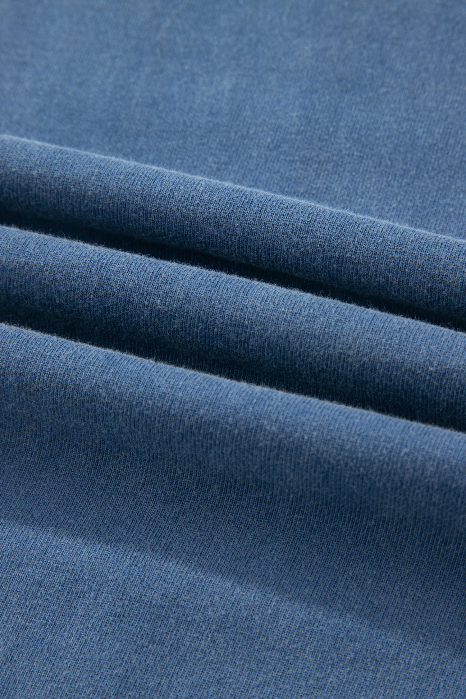 Dusty Blue washed cotton wide leg pants with drawstring waist, oversized patch pockets, and relaxed fit.