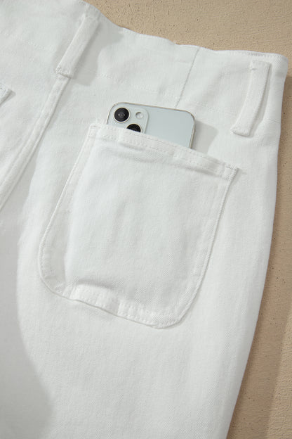 White high rise wide leg jeans with double-button waistband, front pockets and cropped hem.