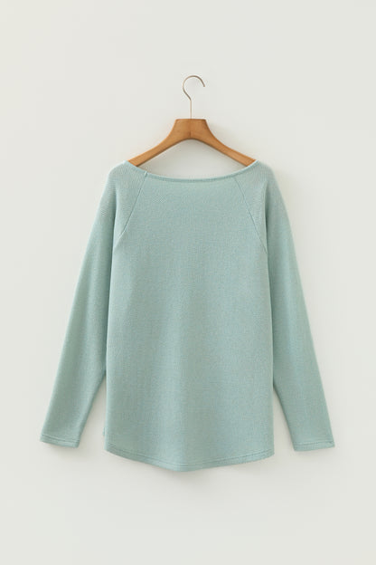 Seafoam Mist textured raglan long sleeve top with round neckline, relaxed fit, and curved hem